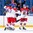 BUFFALO, NEW YORK - DECEMBER 31: The Czech Republic's Martin Kaut #16 celebrates his second period goal against Switzerland alongside teammates Martin Necas #8 and Philipp Kurashev #23 during the preliminary round of the 2018 IIHF World Junior Championship. (Photo by Andrea Cardin/HHOF-IIHF Images)

